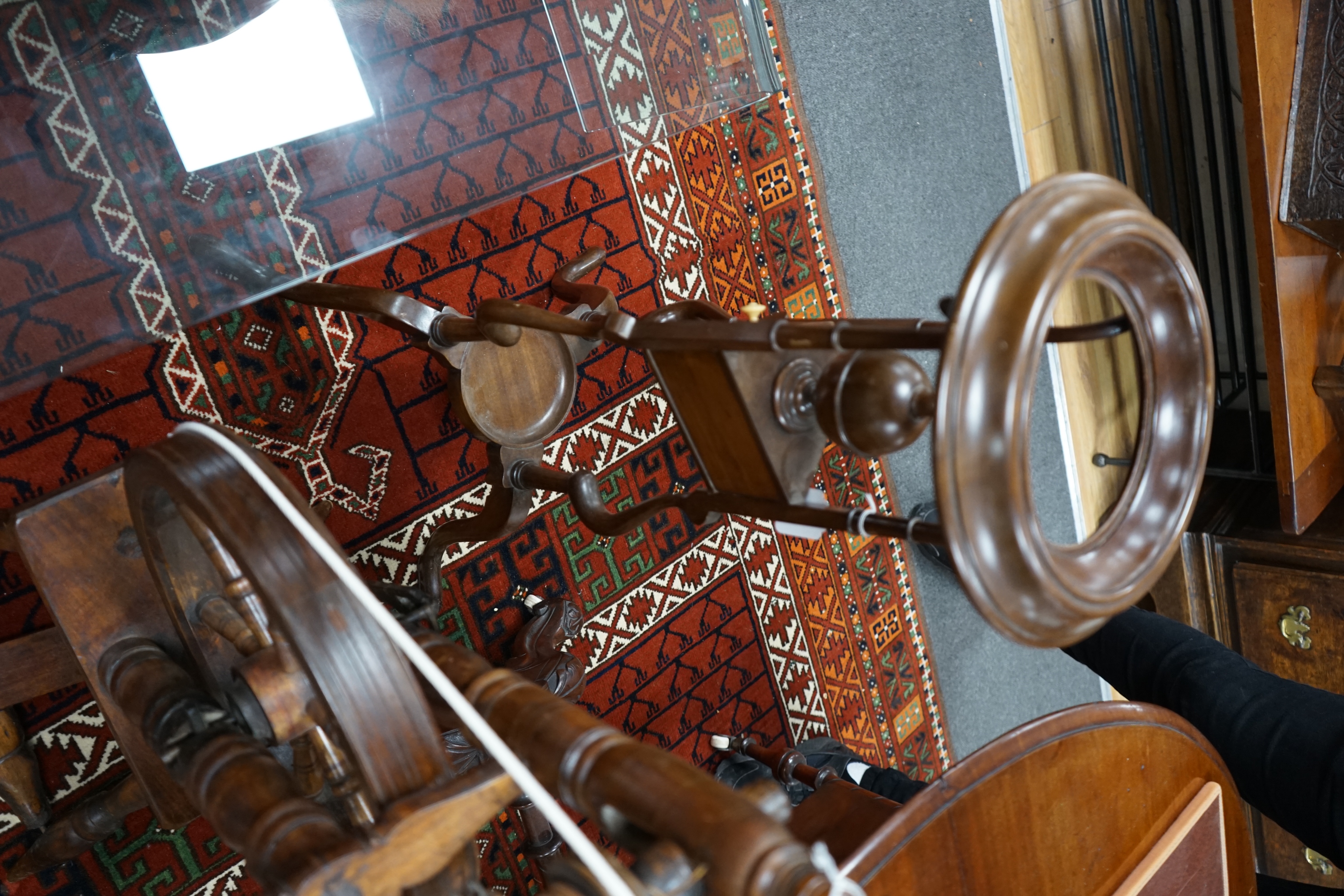 A turned fruitwood and beech spinning wheel, height 92cm together with a Georgian style wash stand